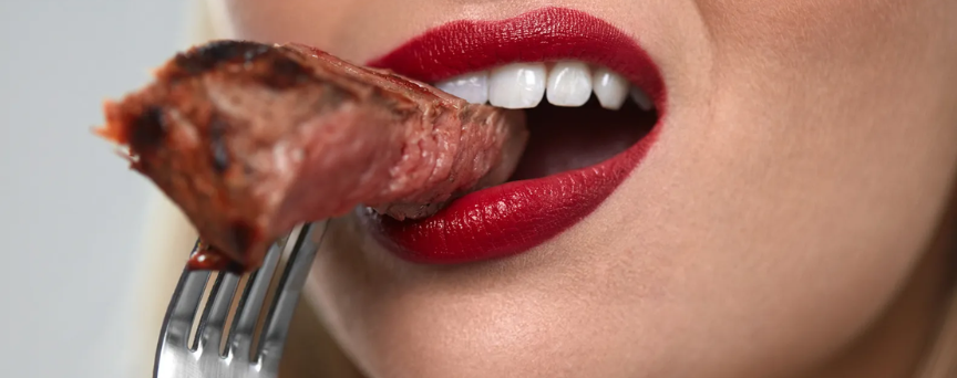 woman hesitating to eat organ meat
